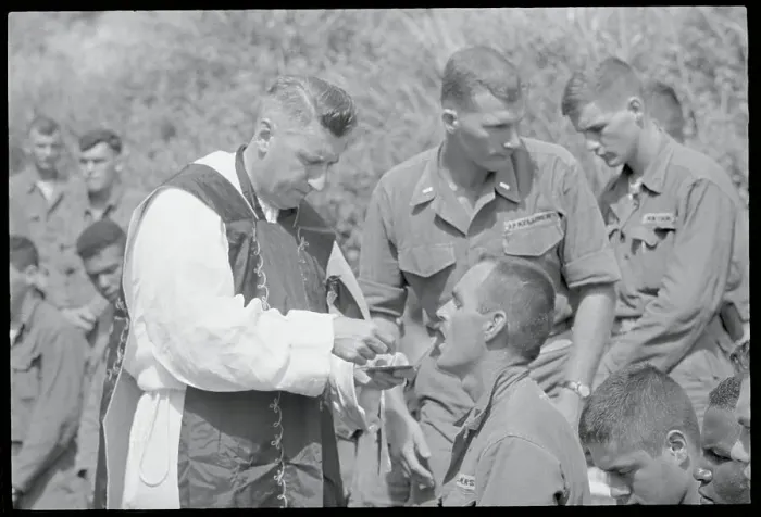 Framed Print : John O'Connor Offering Communion to Soldier Framed Print : John O'Connor Offering Communion to Soldier