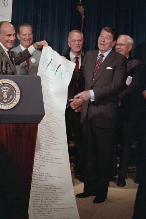 Framed Print : John Richman with Lengthy Scroll on Tax Reform Framed Print : John Richman with Lengthy Scroll on Tax Reform