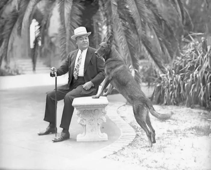 Framed Print : John Ringling Sitting on Bench with Dog at His side Framed Print : John Ringling Sitting on Bench with Dog at His side