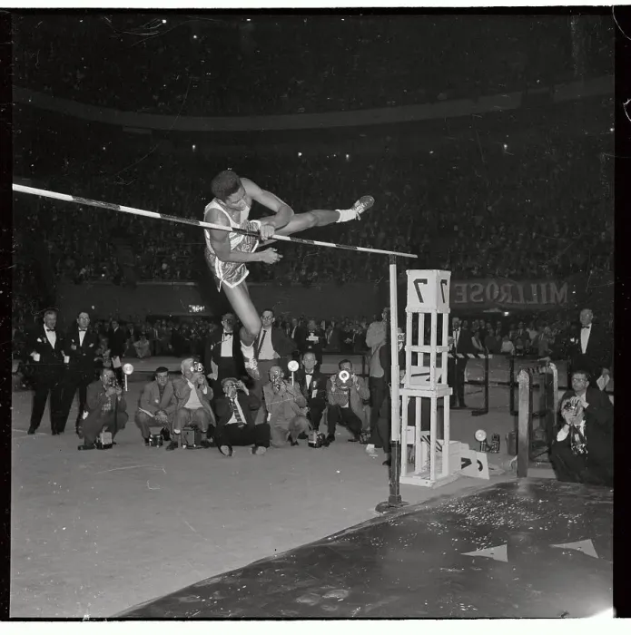 Framed Print : John Thomas Clearing the High Bar