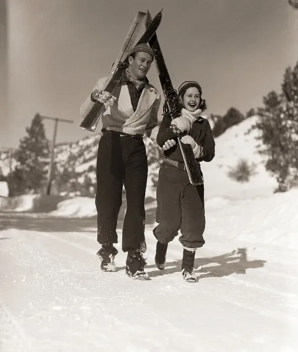 Framed Print : John Wayne and Barbara Read on Ski Slopes Framed Print : John Wayne and Barbara Read on Ski Slopes