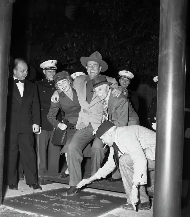 Framed Print : John Wayne Puts His Foot Into Cement Framed Print : John Wayne Puts His Foot Into Cement