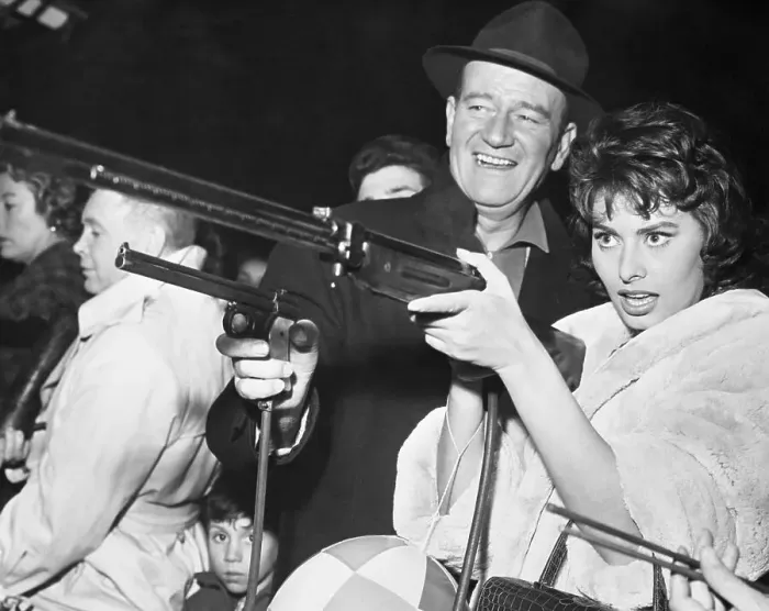 Framed Print : John Wayne and Sophia Loren Gun Play Framed Print : John Wayne and Sophia Loren Gun Play