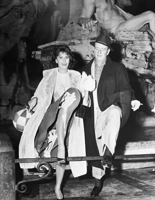 Framed Print : John Wayne and Sophia Loren are High-Stepping Sightseers Framed Print : John Wayne and Sophia Loren are High-Stepping Sightseers