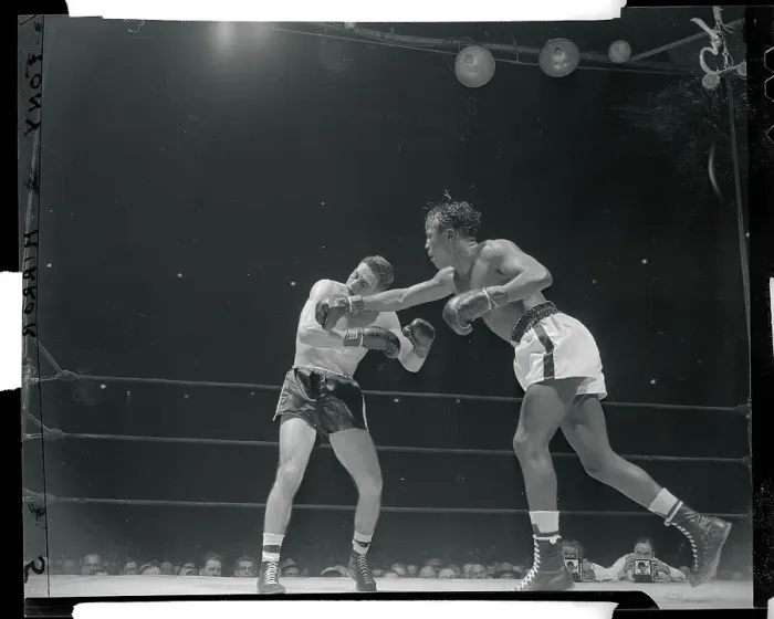 Framed Print : Johnny Bratton Punching Rocky Castellani Framed Print : Johnny Bratton Punching Rocky Castellani