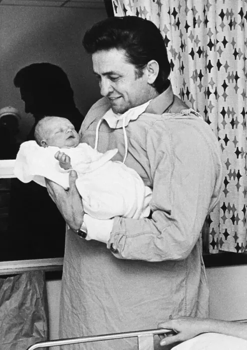 Framed Print : Johnny Cash Holding Newborn Son Framed Print : Johnny Cash Holding Newborn Son