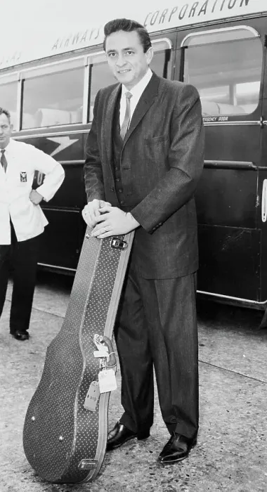 Framed Print : Johnny Cash Standing with Guitar Case Framed Print : Johnny Cash Standing with Guitar Case