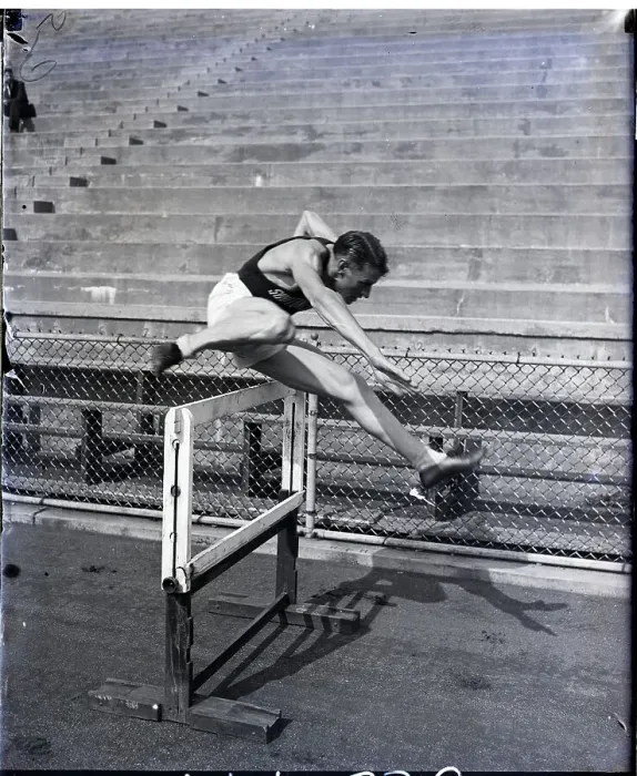 Framed Print : Johnny Morris Hurdling Action Framed Print : Johnny Morris Hurdling Action