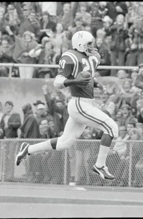 Framed Print : Johnny Rodgers Running In Air with Ball Framed Print : Johnny Rodgers Running In Air with Ball