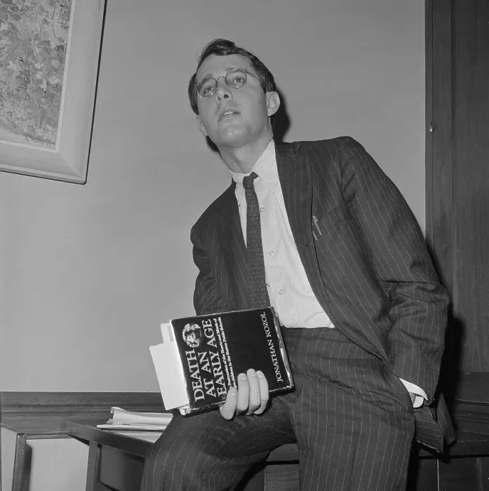 Framed Print : Jonathan Kozol Holding Book He Wrote Framed Print : Jonathan Kozol Holding Book He Wrote
