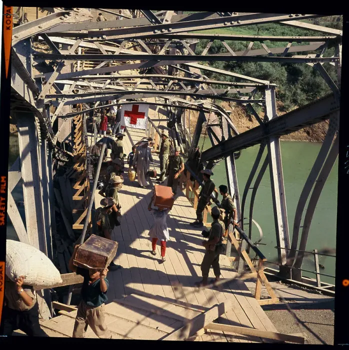 Framed Print : Jordanian Refugees Crossing a Bridge Framed Print : Jordanian Refugees Crossing a Bridge