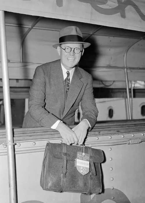 Framed Print : Joseph P. Kennedy Standing on Gangway With His Briefcase