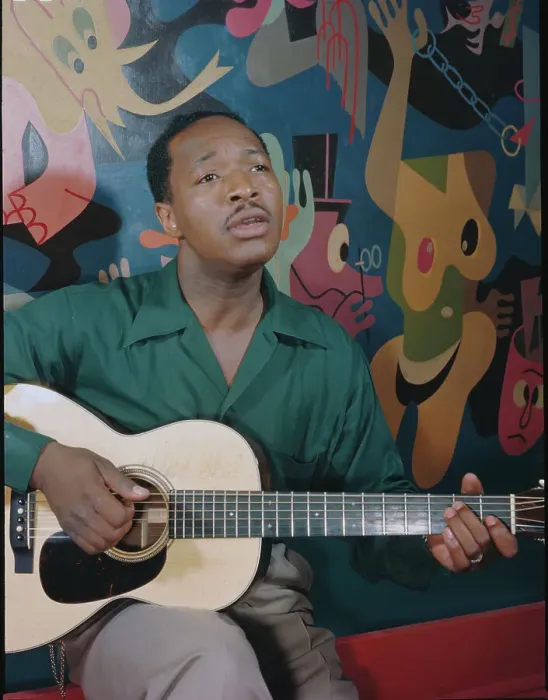 Framed Print : Josh White Playing Guitar and Singing Framed Print : Josh White Playing Guitar and Singing