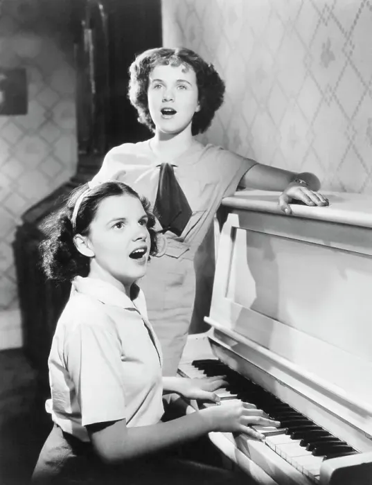 Framed Print : Judy Garland and Deanna Durbin Singing at Piano Framed Print : Judy Garland and Deanna Durbin Singing at Piano