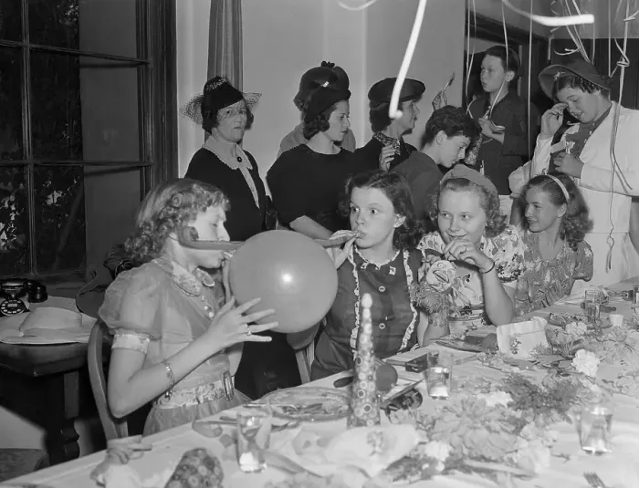 Framed Print : Judy Garland with Friends at Festive Occasion Framed Print : Judy Garland with Friends at Festive Occasion
