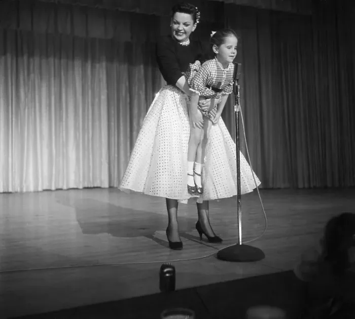 Framed Print : Judy Garland Holding her Daughter Framed Print : Judy Garland Holding her Daughter