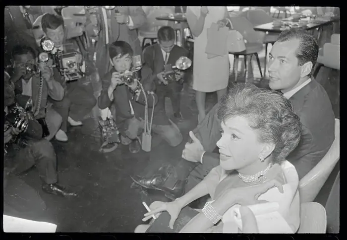 Framed Print : Judy Garland and Mark Herron with Press Framed Print : Judy Garland and Mark Herron with Press