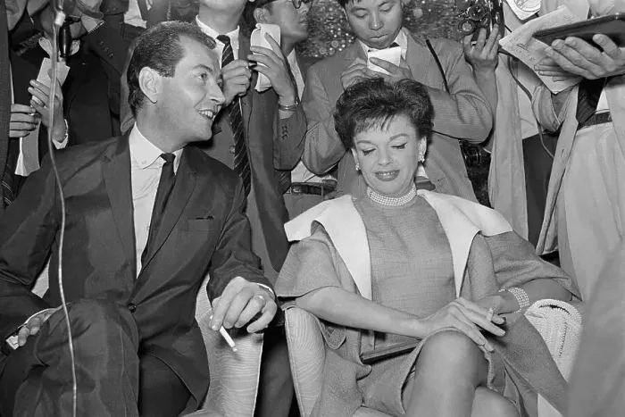 Framed Print : Judy Garland and Mark Herron with Press Framed Print : Judy Garland and Mark Herron with Press