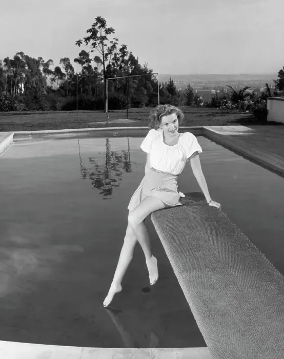 Framed Print : Judy Garland Posing On Diving Board Framed Print : Judy Garland Posing On Diving Board