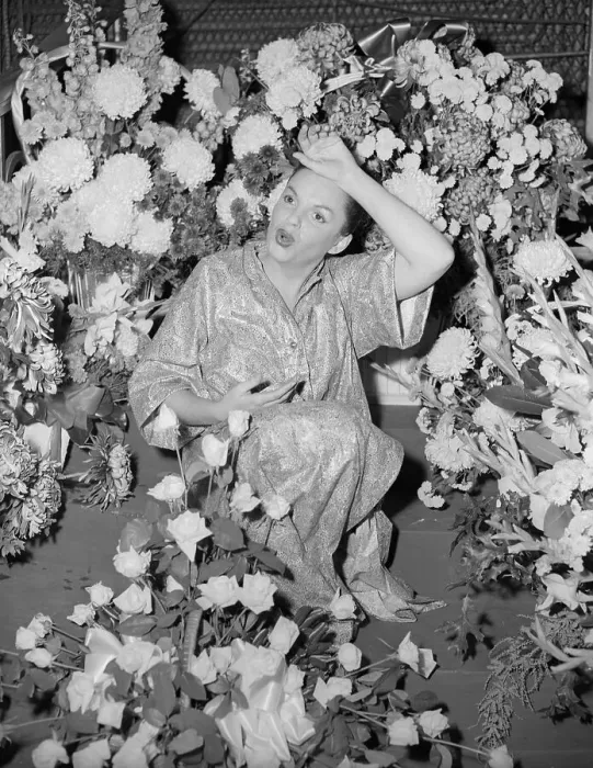 Framed Print : Judy Garland Posing with Flower Display Framed Print : Judy Garland Posing with Flower Display