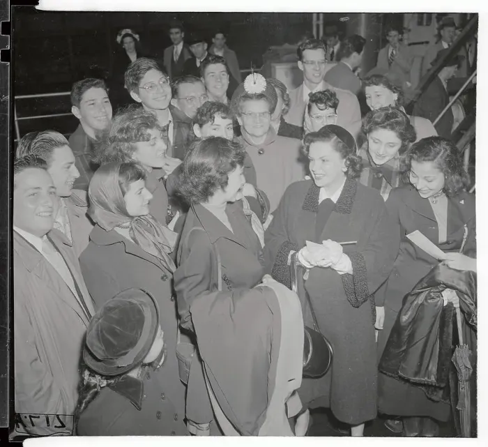Framed Print : Judy Garland Signing Autograph in Crowd of Fans Framed Print : Judy Garland Signing Autograph in Crowd of Fans