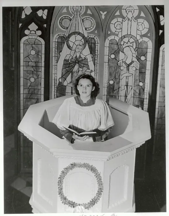 Framed Print : Judy Garland Sitting with Book Framed Print : Judy Garland Sitting with Book