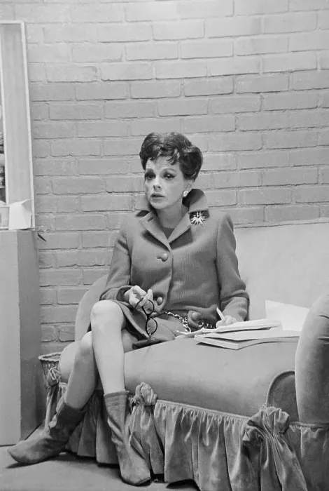 Framed Print : Judy Garland Sitting on Sofa Framed Print : Judy Garland Sitting on Sofa