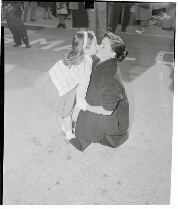 Framed Print : Judy Garland Stooping to Kiss Her Daughter Liza Framed Print : Judy Garland Stooping to Kiss Her Daughter Liza