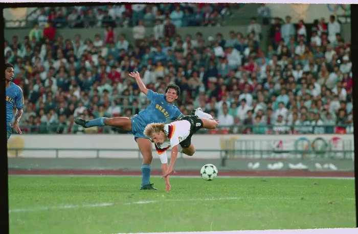 Framed Print : Juergen Klinsmann Tripping Over Geovani Silva Framed Print : Juergen Klinsmann Tripping Over Geovani Silva