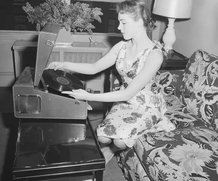 Framed Print : Julie Andrews Putting Record on Phonograph Framed Print : Julie Andrews Putting Record on Phonograph