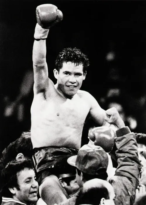 Framed Print : Julio Cesar Chavez Raises Gloved Arm