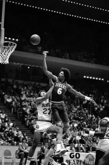 Framed Print : Julius Erving Jumping Over Opponent to Score Framed Print : Julius Erving Jumping Over Opponent to Score