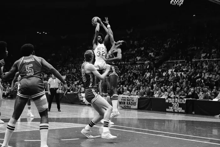 Framed Print : Julius Erving Leaping Before Shooting Basket