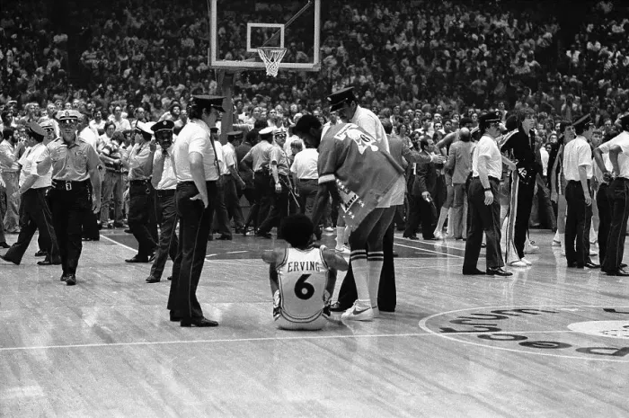 Framed Print : Julius Erving Sitting on Floor After Fight on Court Framed Print : Julius Erving Sitting on Floor After Fight on Court
