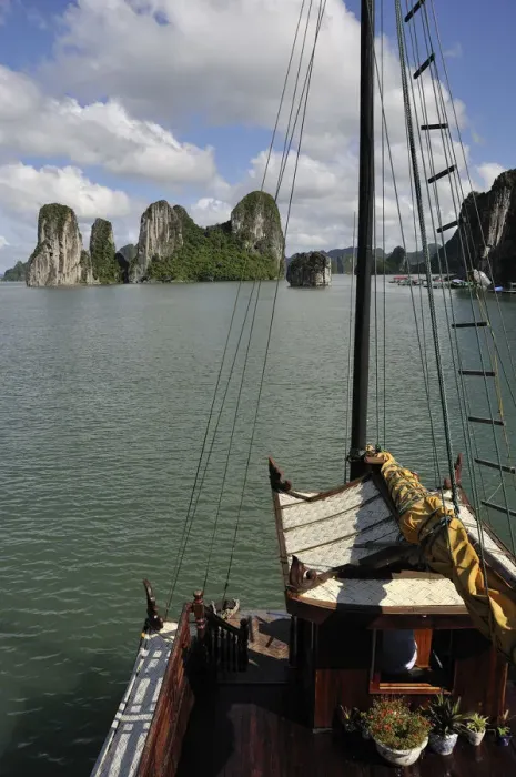 Framed Print : Junk boat navigating in Halong Bay Framed Print : Junk boat navigating in Halong Bay