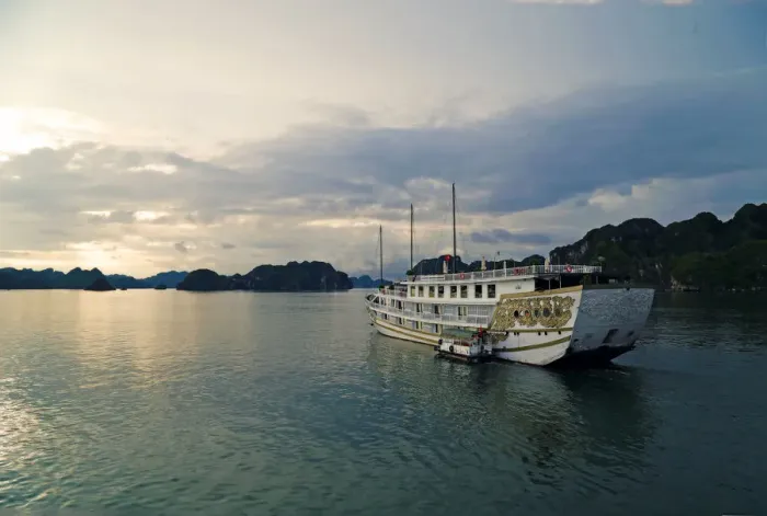 Framed Print : Junk cruise ship going to anchor for the night, Halong Bay, Vietnam Framed Print : Junk cruise ship going to anchor for the night, Halong Bay, Vietnam