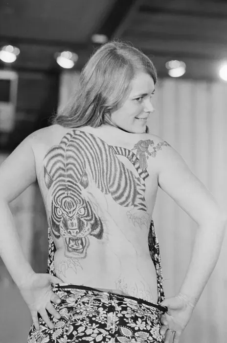 Framed Print : Kathy Sundahl Displays Tattoo On Back Framed Print : Kathy Sundahl Displays Tattoo On Back