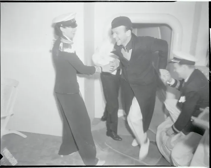 Framed Print : Kay Francis Helping Fred Astaire
