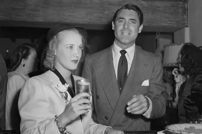 Framed Print : Kay Williams & Cary Grant At Party