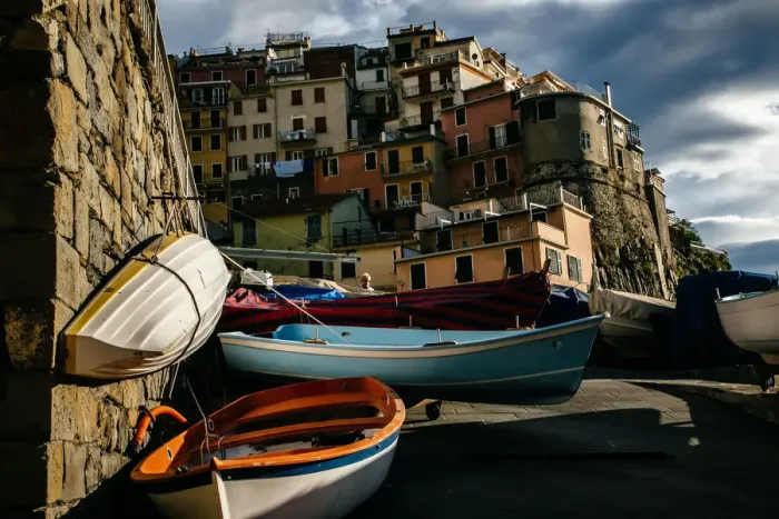 Framed Print : Kayaks with colorful houses of Manarola village in Cinque Terre National Park, Liguria, Italy Framed Print : Kayaks with colorful houses of Manarola village in Cinque Terre National Park, Liguria, Italy