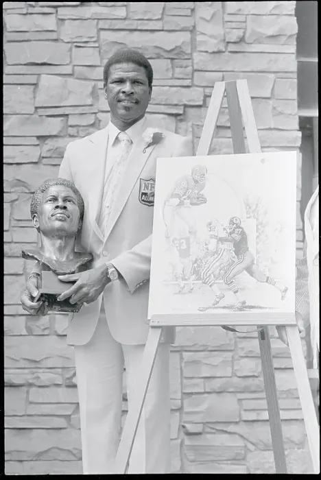 Framed Print : Ken Houston Holding a Bust Framed Print : Ken Houston Holding a Bust