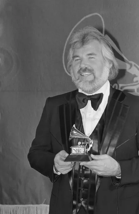 Framed Print : Kenny Rogers Holding His Grammy Framed Print : Kenny Rogers Holding His Grammy