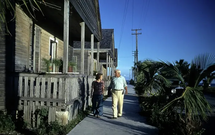 Framed Print : KEY WEST, FL - CIRCA 1946: A couple walks down a path in Key West, Florida Framed Print : KEY WEST, FL - CIRCA 1946: A couple walks down a path in Key West, Florida