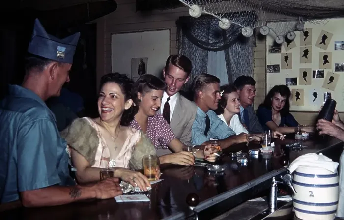 Framed Print : KEY WEST, FL - CIRCA 1946: A view as young people sit at a bar for a drink in Key West Framed Print : KEY WEST, FL - CIRCA 1946: A view as young people sit at a bar for a drink in Key West