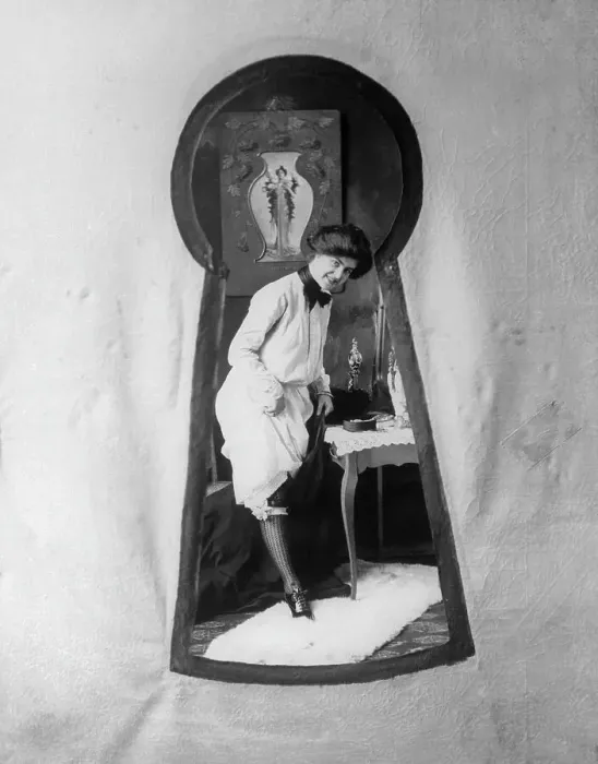 Framed Print : Through Keyhole, Woman Dressing Framed Print : Through Keyhole, Woman Dressing
