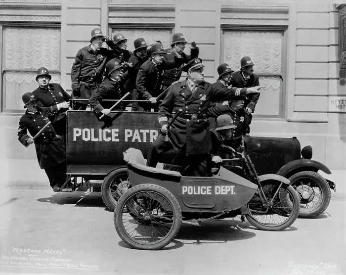 Framed Print : Keystone Kops Riding Patrol Wagons in Keystone Hotel Framed Print : Keystone Kops Riding Patrol Wagons in Keystone Hotel