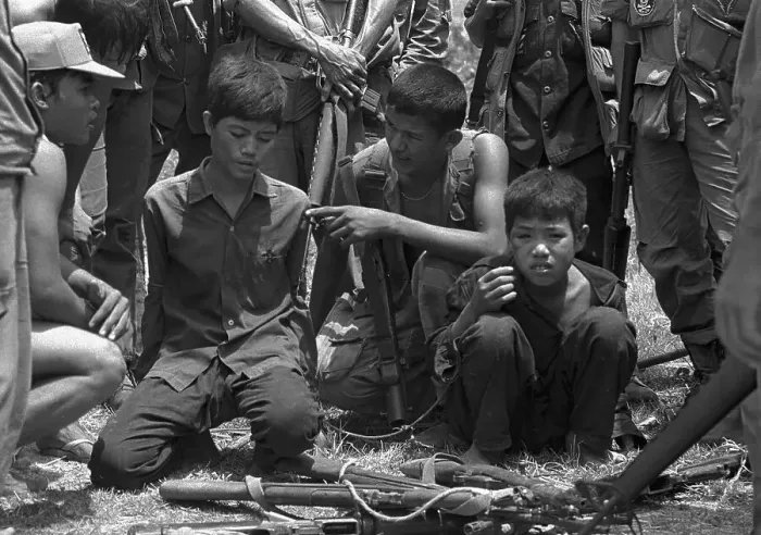 Framed Print : Khmer Rouge Soldiers Being Questioned Framed Print : Khmer Rouge Soldiers Being Questioned
