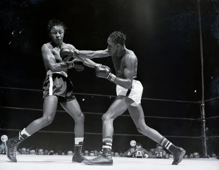 Framed Print : Kid Gavilan Punches Johnny Bratton Framed Print : Kid Gavilan Punches Johnny Bratton