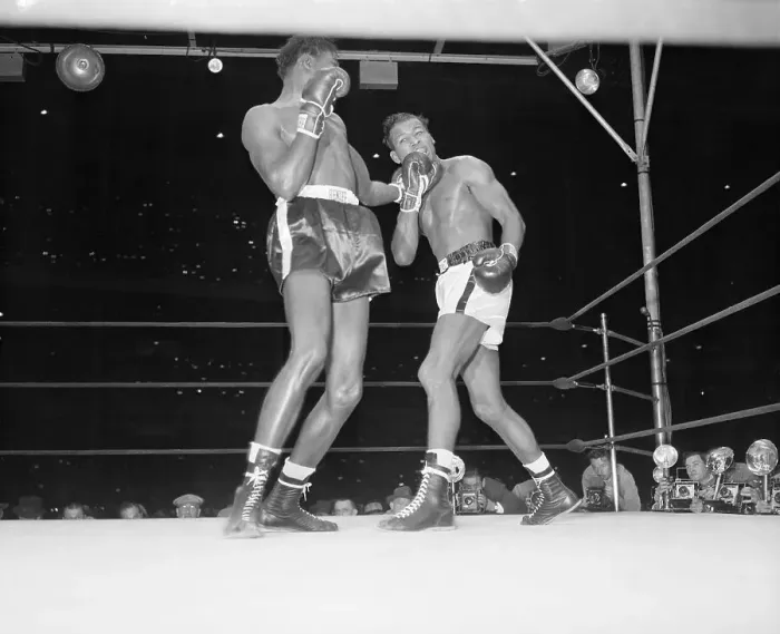 Framed Print : Kid Gavilan Punches Ray Robinson on Chin Framed Print : Kid Gavilan Punches Ray Robinson on Chin
