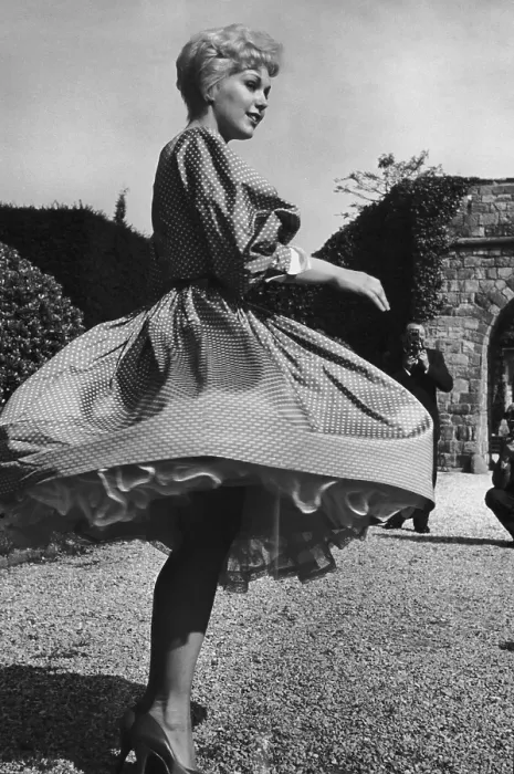 Framed Print : Kim Novak. American actress Kim Novak twirls for the camera at the Cannes Film Festival Framed Print : Kim Novak. American actress Kim Novak twirls for the camera at the Cannes Film Festival